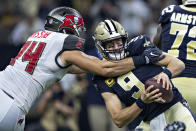 <p>Drew Brees #9 of the New Orleans Saints is grabbed in the second quarter by Carl Nassib #94 of the Tampa Bay Buccaneers at Mercedes-Benz Superdome on September 9, 2018 in New Orleans, Louisiana. (Photo by Wesley Hitt/Getty Images) </p>