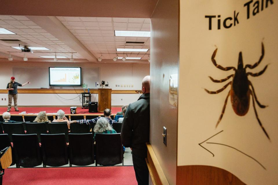 Leeanne Garrett, an entomologist with the Ohio Department of Health in Columbus, speaks during a special presentation on ticks, at New Philadelphia High School.