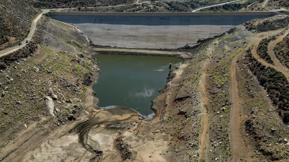 A drone view shows the Eggares irrigation dam on the island of Naxos, Greece on June 20, 2024. - Stelios Misinas/Reuters