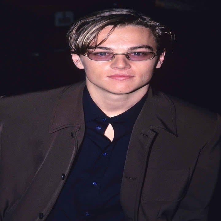 A young Leo wearing sunglasses