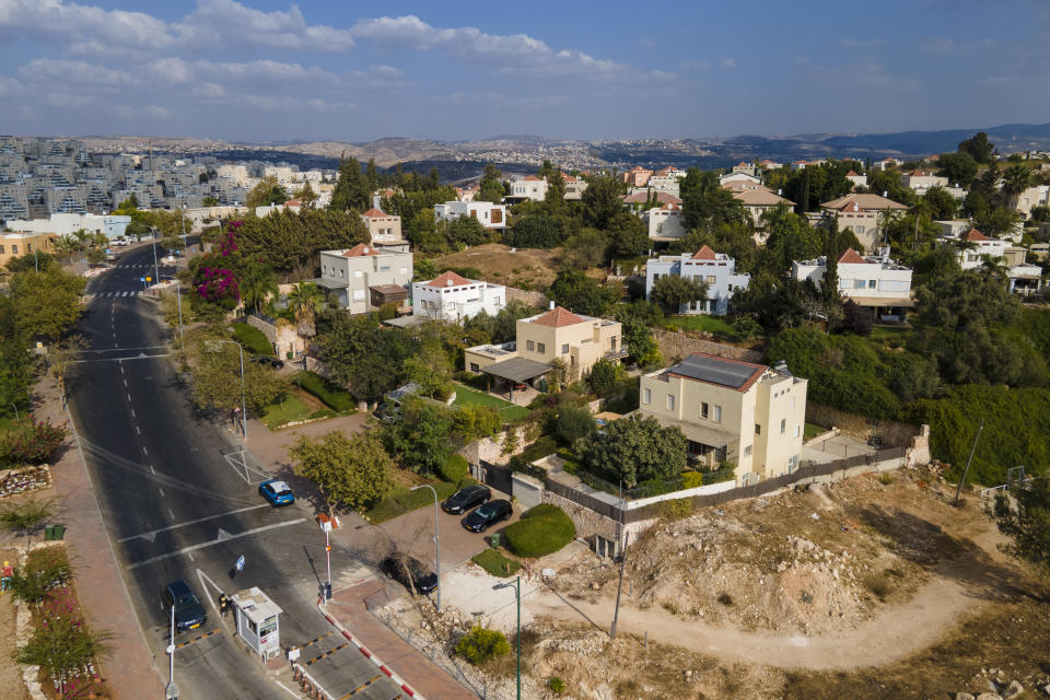 A view of the entrance to the West Bank settlement of Kfar HaOranim, where Maj. Gen. Hertzi Halev lives in, Thursday, Oct. 20, 2022. For the first time, a Jewish West Bank settler is set to take the reigns as chief of staff of Israel's military, the enforcer of the country's 55-year-old military occupation. Halevi’s rise caps the decades-long transformation of the settler movement from a small group of religious ideologues to a diverse and influential force at the heart of the Israeli mainstream. (AP Photo/Ariel Schalit)