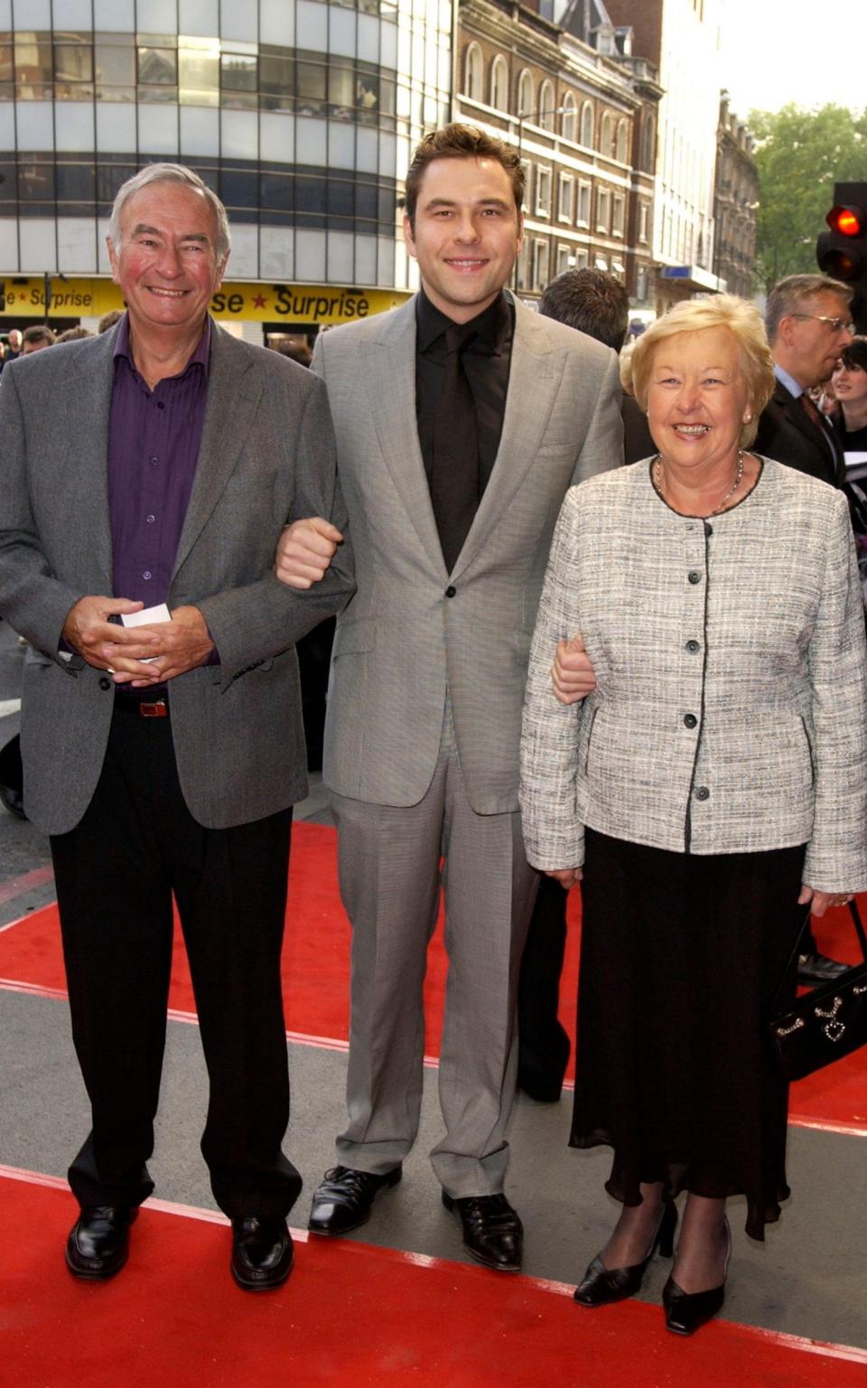 David Walliams and his parents on the red carpet, they are all smiling - James Veysey/Camera Press