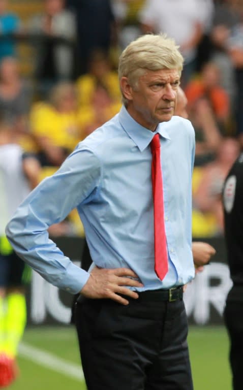 Arsenal's French manager Arsene Wenger watches the match against Watford at Vicarage Road Stadium in Watford, north of London on August 27, 2016