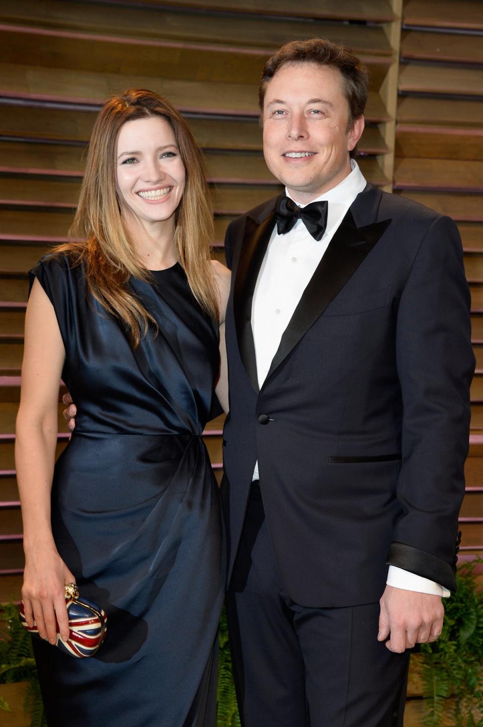 Talulah Riley (L) and CEO of Tesla Motors Elon Musk attend the 2014 Vanity Fair Oscar Party hosted by Graydon Carter on March 2, 2014 (Getty Images)