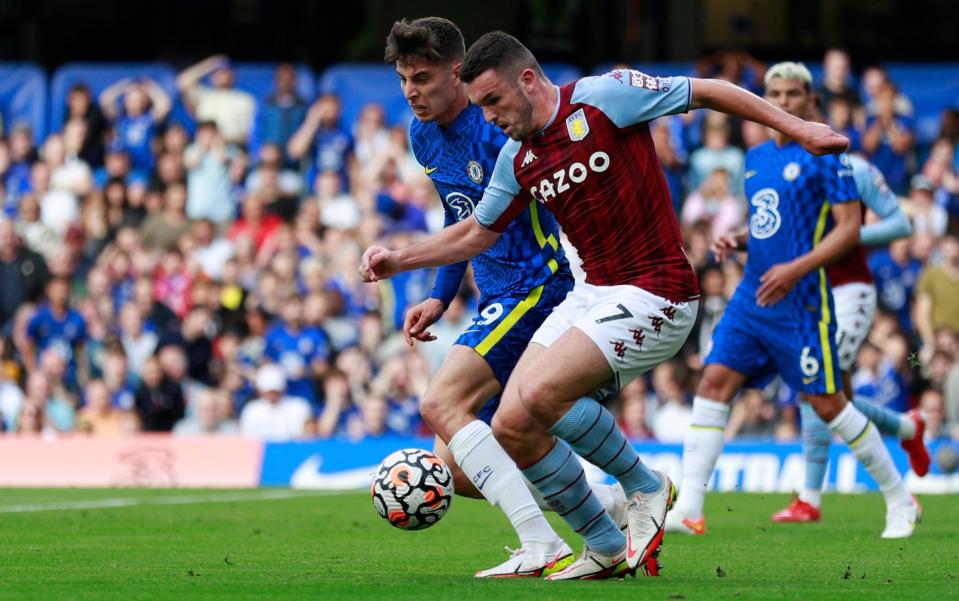 Chelsea's Kai Havertz, left, is challenged by Aston Villa's John McGinn during the English Premier League match between Chelsea and Aston Villa at the Stamford Bridge Stadium in London, Saturday, Sept. 11, 2021. - AP