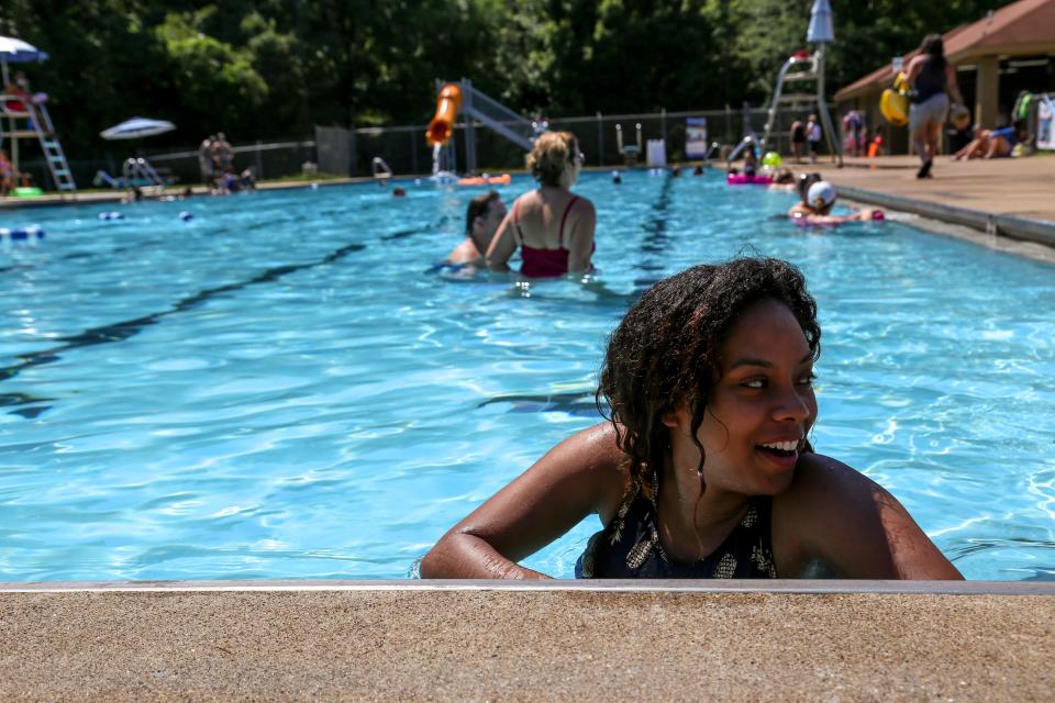 Pool-goers joke around at the edge of the pool on an especially hot summer day at Swan Lake Pool in Clarksville, Tenn. in this file photo.