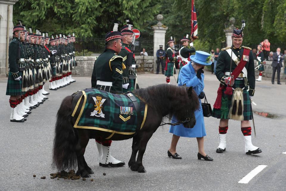 The Queen didn’t look impressed when an adorable pony, called Cruachan IV, defecated in front of her at Balmoral Castle yesterday. Photo: Getty Images