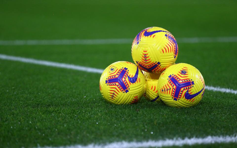 The Nike Flight Hi-Vis Premier League match balls are seen prior to the Premier League match between Manchester City and Aston Villa  - GETTY IMAGES