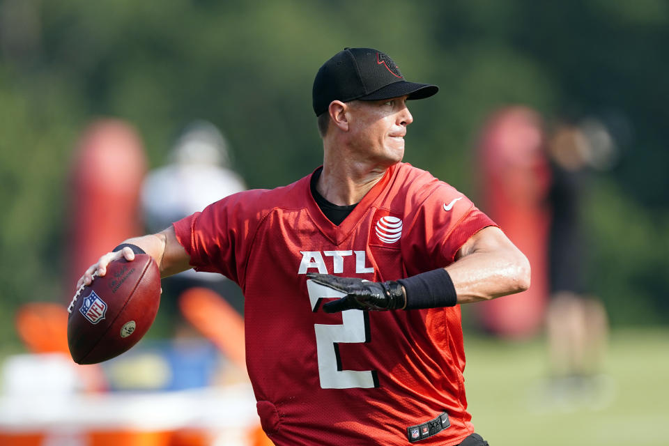 Atlanta Falcons quarterback Matt Ryan (2) throws a pass during their NFL training camp football practice Saturday, July 31, 2021, in Flowery Branch, Ga. (AP Photo/John Bazemore)