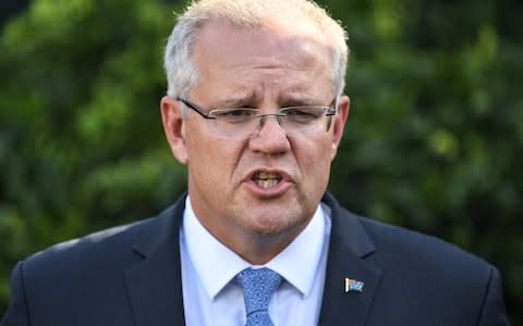 Australian Prime Minister Scott Morrison said he would consider 'all options' in reviewing ties  - Credit: Getty