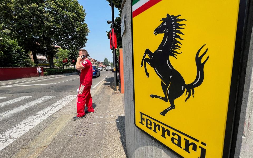 A Ferrari worker outside the factory in Maranello, Italy, 2022