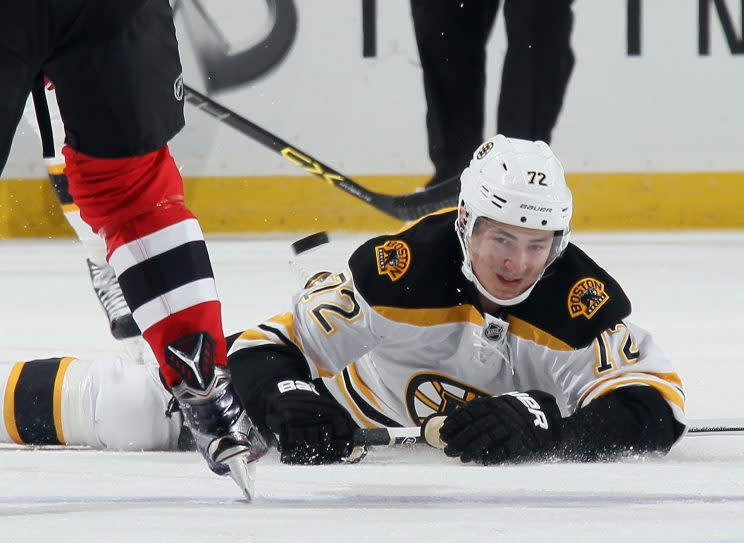 NEWARK, NJ - MARCH 29: Frank Vatrano #72 of the Boston Bruins hits the ice to block a shot against the New Jersey Devils at the Prudential Center on March 29, 2016 in Newark, New Jersey. (Photo by Bruce Bennett/Getty Images)