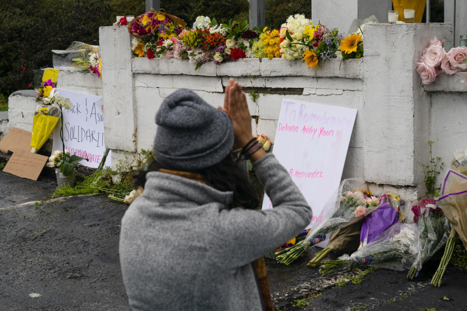 A woman mourns outside Gold Spa on Thursday, March 18, 2021 in Atlanta, GA. (Elijah Nouvelage for The Washington Post via Getty Images)