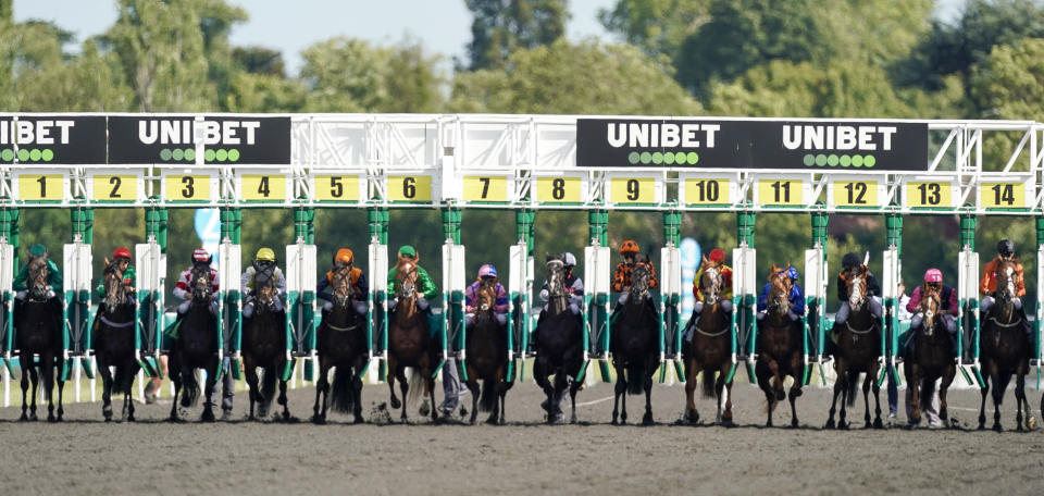 SUNBURY, ENGLAND - JULY 13: Runners in The Unibet Thanks The Frontline Workers Handicapn exit the starting stalls at Kempton Park on July 13, 2020 in Sunbury, England. Owners are allowed to attend if they have a runner at the meeting otherwise racing remains behind closed doors to the public due to the Coronavirus pandemic. (Photo by Alan Crowhurst/Getty Images)