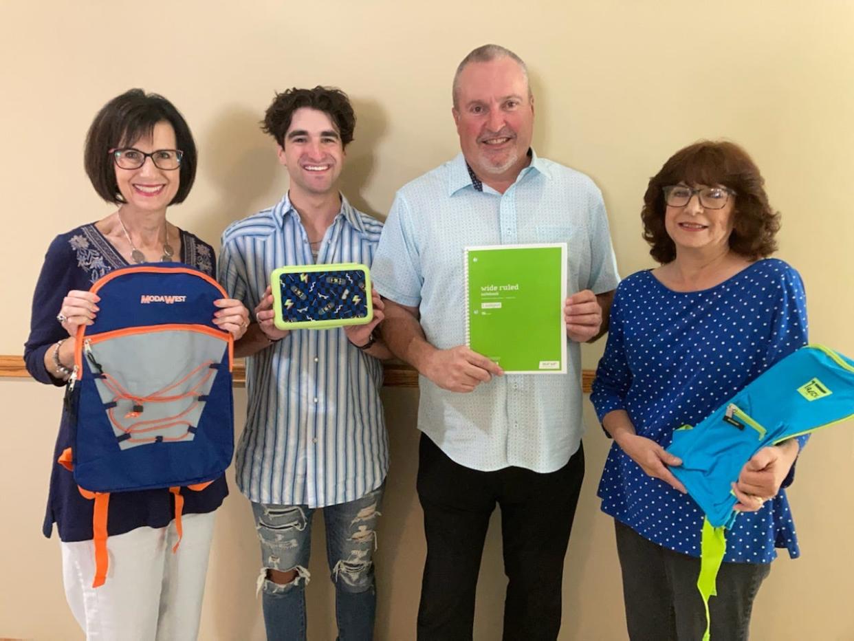 Helping prepare for the Back2School Blessing at Bethel Church of Tallmadge are, from left, Bonnie Collings, Jonathan Anderson, Pastor Phil Anderson and Lu Ann Kaschner.