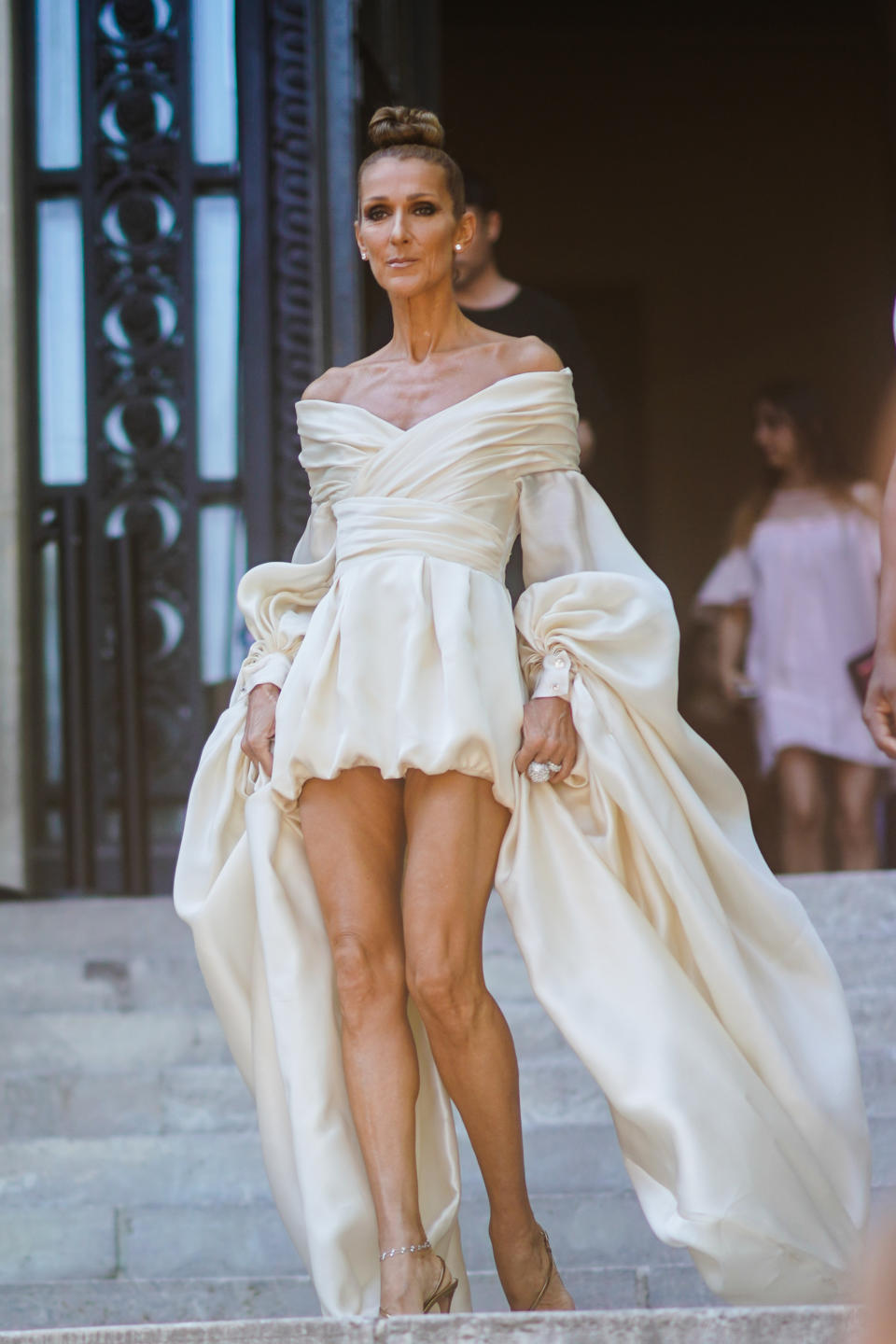 Dion stunned in an ivory-coloured Alexandre Vauthier mini dress during Paris Fashion Week on July 2, 2019. (Photo by Edward Berthelot/Getty Images)
