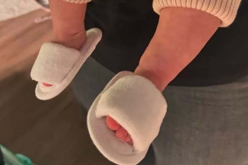 Anne-Marie's baby pictured with little slippers on