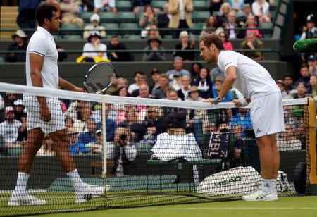 Britain Tennis - Wimbledon - All England Lawn Tennis & Croquet Club, Wimbledon, England - 4/7/16 France's Richard Gasquet talks with France's Jo-Wilfried Tsonga before he retires from their match due to injury REUTERS/Tony O'Brien