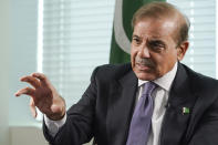 Prime Minister of Pakistan Shehbaz Sharif speaks during an interview with The Associated Press, Thursday, Sept. 22, 2022 at United Nations headquarters. Sharif said he came to the United Nations to tell the world that his country is the victim of unprecedented climate change-induced flooding that has submerged one-third of its territory and left 33 million people scrambling to survive, and to warn that “tomorrow this tragedy can fall on some other country.” (AP Photo/Mary Altaffer)