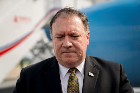 U.S. Secretary of State Mike Pompeo pauses while speaking to members of the media following two days of meetings with Kim Yong Chol, a North Korean senior ruling party official and former intelligence chief, before boarding his plane at Sunan International Airport in Pyongyang, North Korea, July 7, 2018, to travel to Japan. Andrew Harnik/Pool via REUTERS/Files