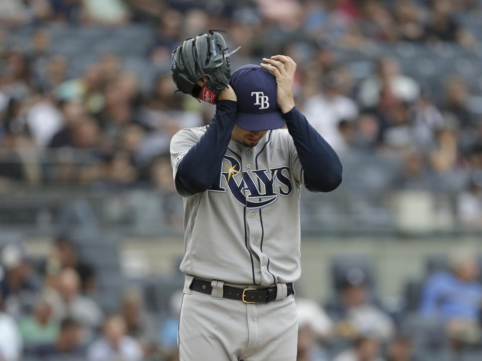 Tampa Bay Rays starting pitcher Blake Snell reacts during the first inning of a baseball game against the New York Yankees at Yankee Stadium, Wednesday, June 19, 2019, in New York. (AP Photo/Seth Wenig)