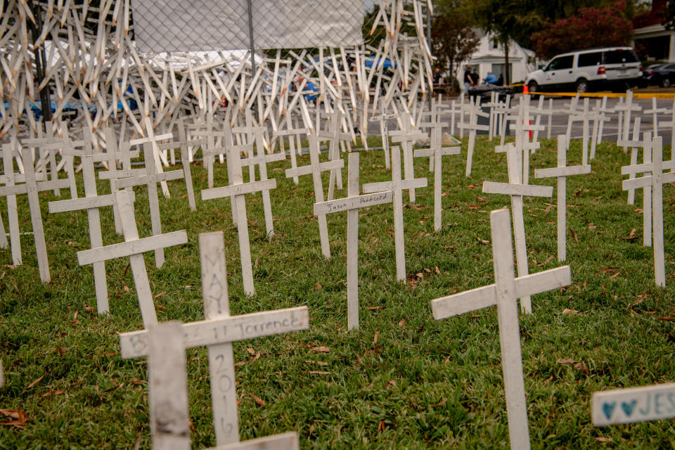 Crosses memorialize overdose deaths in Virginia.  / Credit: Hilary Swift