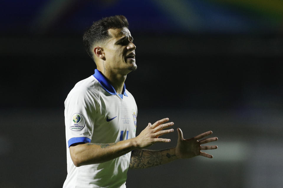 Brazil's Phlippe Coutinho celebrates scoring his side's second goal against Bolivia during a Copa America Group A soccer match at the Morumbi stadium in Sao Paulo, Brazil, Friday, June 14, 2019. (AP Photo/Victor Caivano)