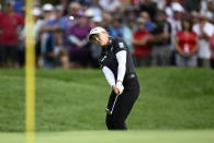 Canada's Brooke Henderson hits the ball on the 18th hole during the first round of the CP Women's Open golf tournament, Thursday, Aug. 25, 2022, in Ottawa, Ontario. (Justin Tang/The Canadian Press via AP)