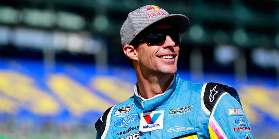 kansas city, ks october 05 travis pastrana, driver of the 60 roush fenway racing ford, walks on the grid during qualifying for the nascar nationwide series 13th annual kansas lottery 300 at kansas speedway on october 5, 2013 in kansas city, kansas photo by sean gardnergetty images