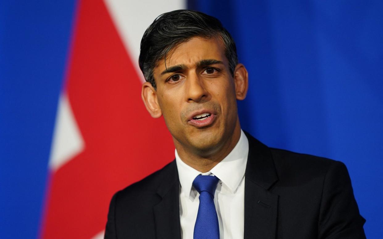Rishi Sunak, the Prime Minister,  hosts a press conference inside the Downing Street Briefing Room, in central London, on December 7, 2023, after Britain and Rwanda sign a new treaty to transfer illegal migrants to the African country.