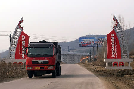 A truck carries coal on a road out of the Helong Frontier Economic Cooperation Zone, in Nanping, Jilin province, China, March 27, 2017. REUTERS/Sue-Lin Wong