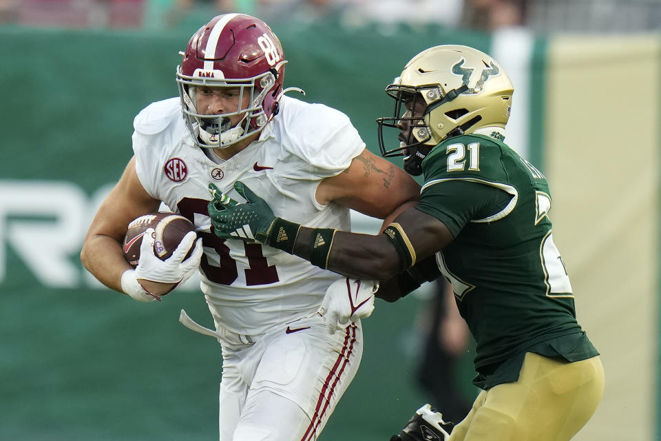 Alabama tight end CJ Dippre (81) is stopped by South Florida defensive back Jaelen Stokes after a catch during the second half of an NCAA college football game Saturday, Sept. 16, 2023, in Tampa, Fla. (AP Photo/Chris O'Meara)