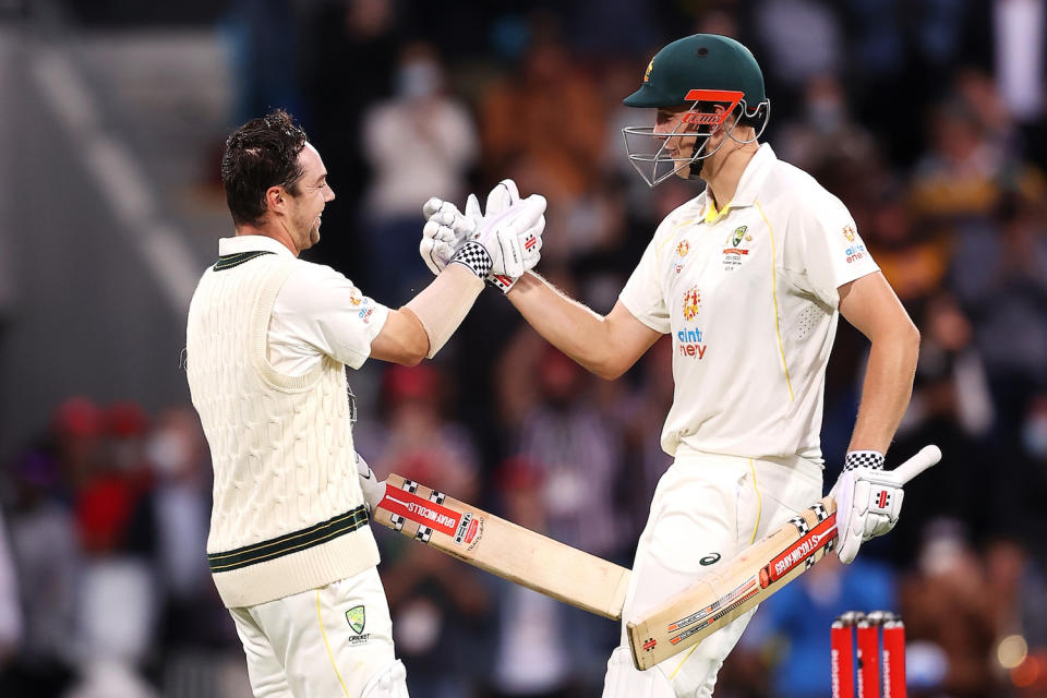 Travis Head of Australia celebrates his century with Cameron Green of Australia during day one of the Fifth Test in the Ashes series in 2022. Photo by Mark Kolbe – CA/Cricket Australia via Getty Images