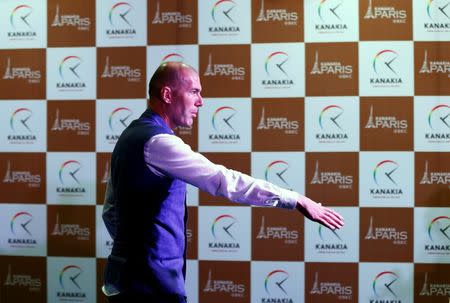 Former French soccer player and current Real Madrid's coach Zinedine Zidane leaves after attending a news conference in Mumbai, India, June 10, 2016. REUTERS/Danish Siddiqui - RTSGW3I