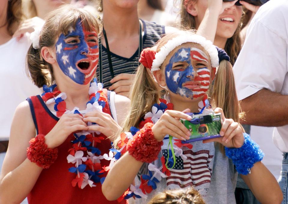 USWNT fans cheer as the teams come onto the field before the first-round game against Denmark at the 1999 FIFA Women's World Cup at Giants Stadium in East Rutherford, New Jersey on June 19, 1999. (TIMOTHY A. CLARY/AFP via Getty Images)