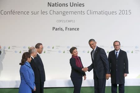 U.S. President Barack Obama (2nd R) is welcomed by French President Francois Hollande (R) and (L to R) French Ecology Minister Segolene Royal, French Foreign Affairs Minister Laurent Fabius, President-designate of COP21, United Nations Secretary General Ban Ki-moon and Christiana Figueres, Executive Secretary of the UN Framework Convention on Climate Change, as he arrives for the opening day of the World Climate Change Conference 2015 (COP21) at Le Bourget, near Paris, France, November 30, 2015. REUTERS/Christian Hartmann