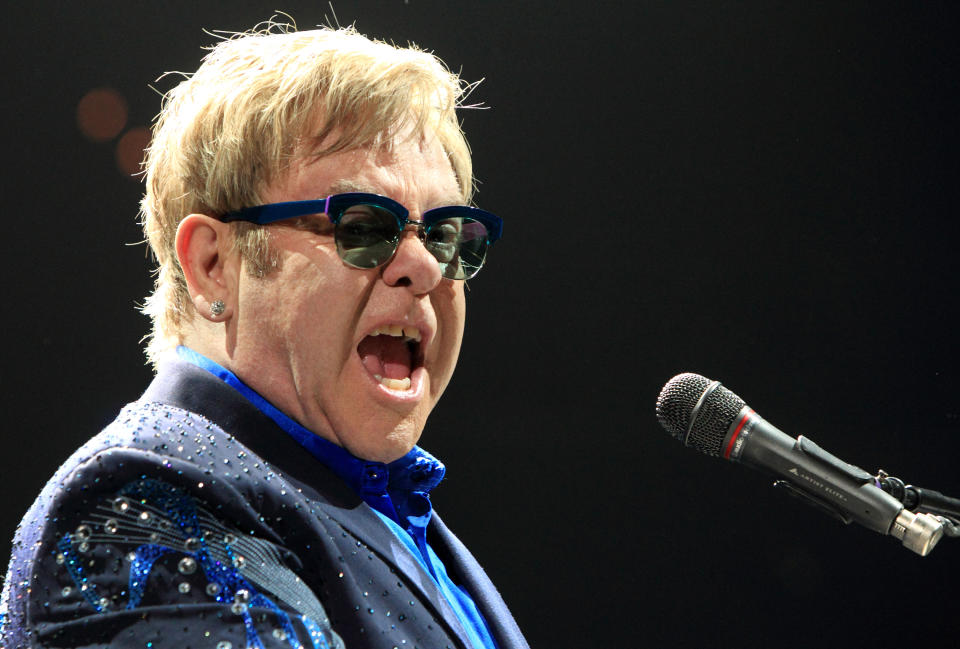 Elton John performs in concert during his Diving Board Tour 2013 at the Verizon Center on Thursday, Nov. 14, 2013, in Washington D.C. (Photo by Owen Sweeney/Invision/AP)