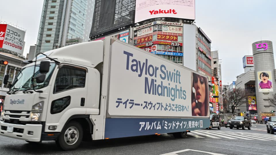 A truck advertising Taylor Swift's Japan tour drives through Shibuya Crossing in Tokyo, Japan, on February 6, 2024. - Richard A. Brooks/AFP/Getty Images