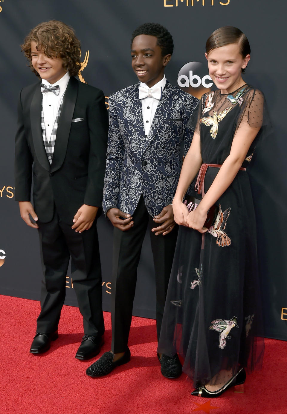 LOS ANGELES, CA - SEPTEMBER 18:  (L-R) Actors Gaten Matarazzo, Caleb McLaughlin, and Millie Bobby Brown attend the 68th Annual Primetime Emmy Awards at Microsoft Theater on September 18, 2016 in Los Angeles, California.  (Photo by David Crotty/Patrick McMullan via Getty Images)