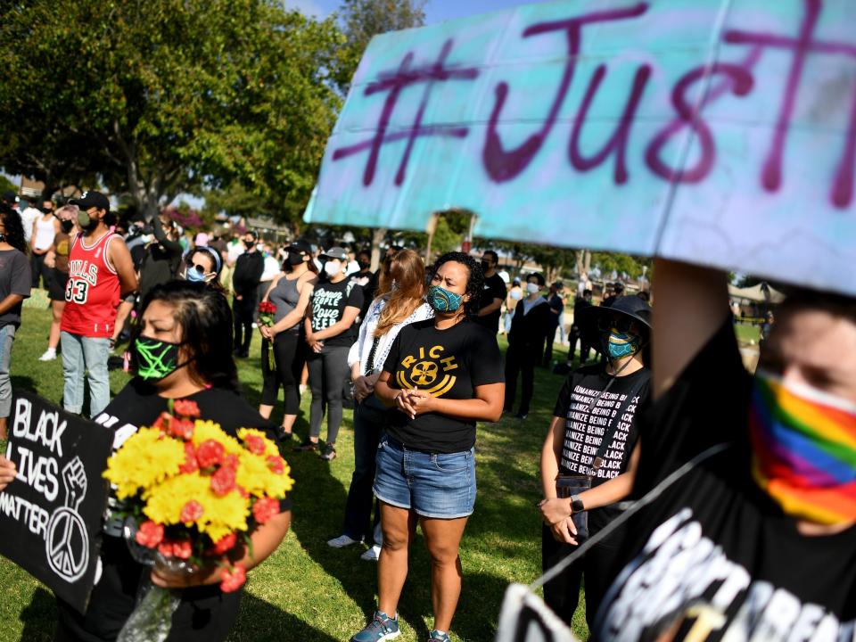 GARDENA, CALIFORNIA JUNE 20, 2020-People stand in unity at a Black Lives Matter Los Angeles rally to call for justice in the fatal shooting of KennethRoss Jr., who was shot by a Gardena police officer in2018.