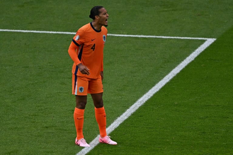 Virgil van Dijk shouts during <a class="link " href="https://sports.yahoo.com/soccer/teams/netherlands/" data-i13n="sec:content-canvas;subsec:anchor_text;elm:context_link" data-ylk="slk:Netherlands;sec:content-canvas;subsec:anchor_text;elm:context_link;itc:0">Netherlands</a>' 3-2 defeat to Austria in their Euro 2024 Group D match (GABRIEL BOUYS)