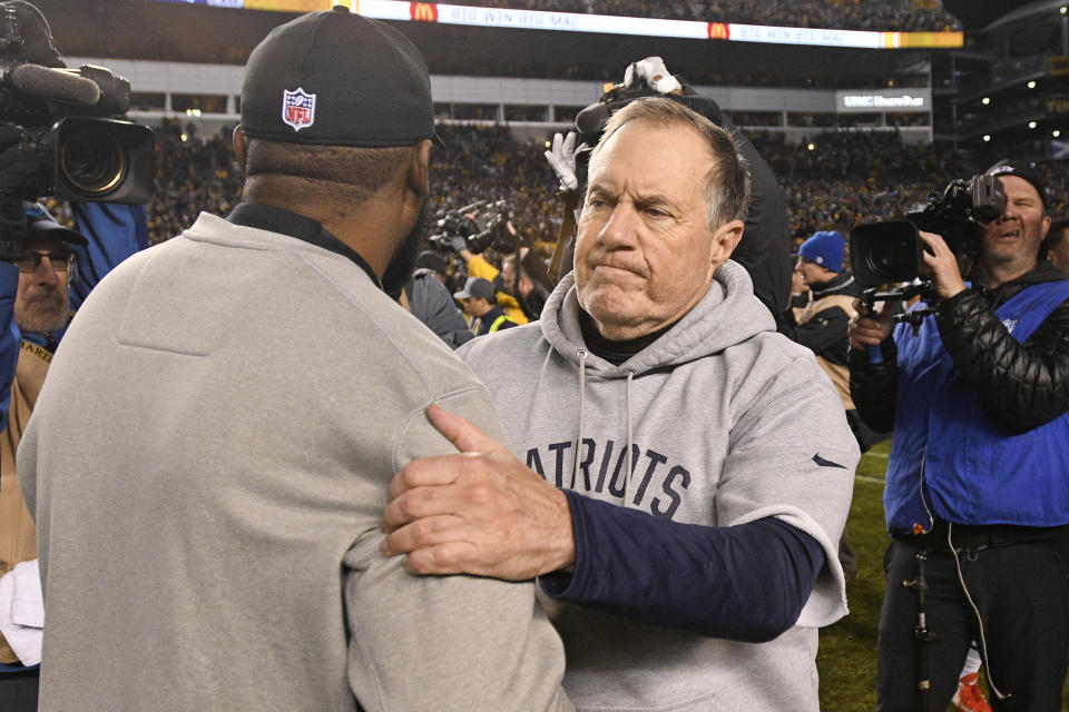 Pittsburgh Steelers head coach Mike Tomlin, left, and New England Patriots head coach Bill Belichick greet each other on the field following an NFL football game in Pittsburgh, Sunday, Dec. 16, 2018. The Steelers won 17-10. (AP Photo/Don Wright)