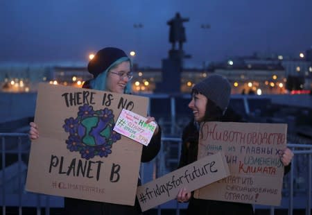 Activists take part in the Global Climate Strike in Saint Petersburg