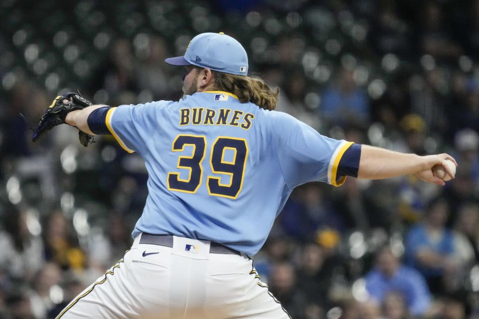 Milwaukee Brewers starting pitcher Corbin Burnes throws during the first inning of a baseball game against the Kansas City Royals Friday, May 12, 2023, in Milwaukee. (AP Photo/Morry Gash)