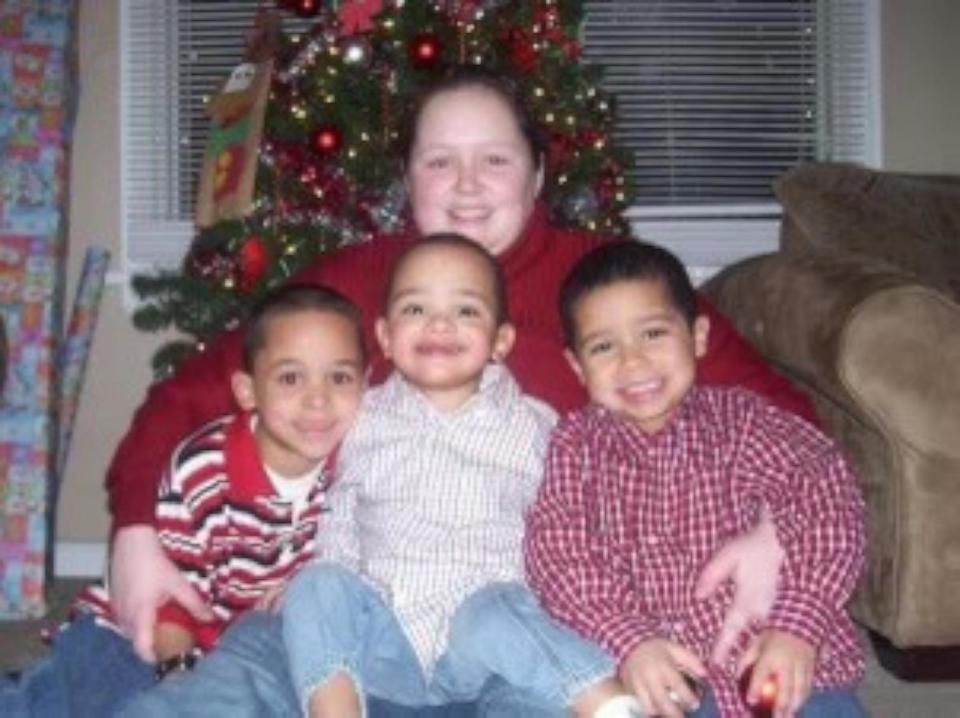 PHOTO: Jennifer Flewellen is pictured with her three sons prior to the 2017 car crash that left her paralyzed and in a coma. (Peggy Means)