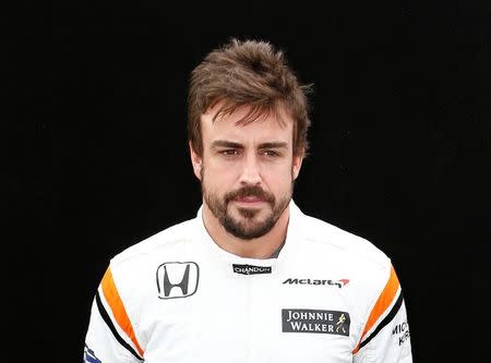 Formula One - F1 - Australian Grand Prix - Melbourne, Australia - 23/03/2017 McLaren driver Fernando Alonso of Spain poses during the driver portrait session at the first race of the year. REUTERS/Brandon Malone