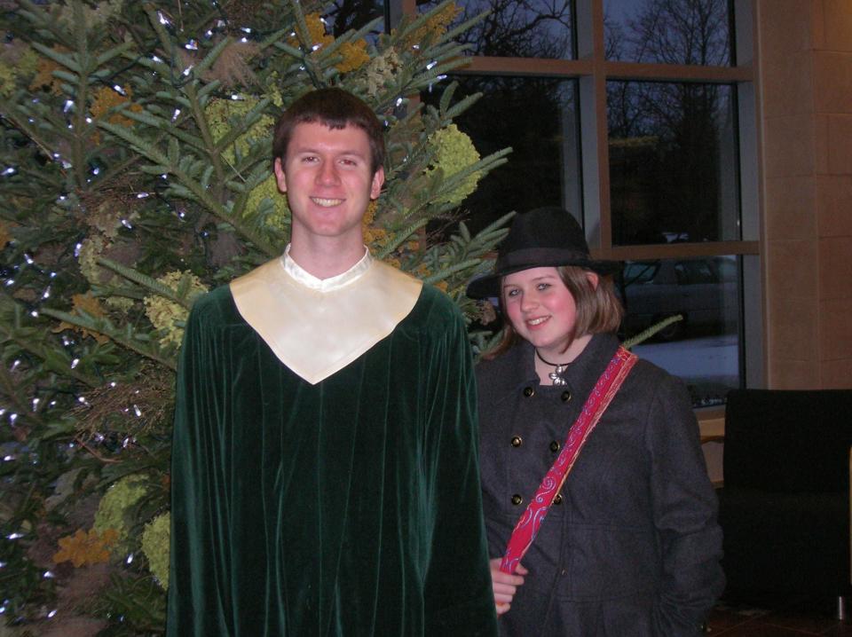 Here I am (with bonus sister!) circa 2010 in my choir robes for a Christmas at Luther concert. Yeah, I have no idea where all that extra neck went either.