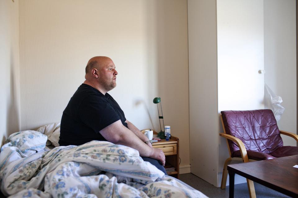 BASTOY ISLAND, HORTEN, NORWAY - APRIL 11:  Espen, 33-years-old sentenced to three years for crime related to narcotics watch television in his bedroom in Bastoy Prison on April 11, 2011 in Bastoy Island, Horten, Norway. Bastoy Prison is a minimum security prison located on Bastoy Island, Norway, about 75 kilometers (46 mi) south of Oslo. The facility is located on a 2.6 square kilometer (1 sq mi) island and hosts 115 inmates. Arne Kvernvik Nilsen, governor of the prison, leads a staff of about 70 prison employees. Of this staff, only five employees remain on the island overnight.  Once a prison colony for young boys, the facility now is trying to become 'the first eco-human prison in the world.' Inmates are housed in wooden cottages and work the prison farm. During their free time, inmates have access to horseback riding, fishing, tennis, and cross-country skiing. (Photo by Marco Di Lauro/Reportage by Getty Images)