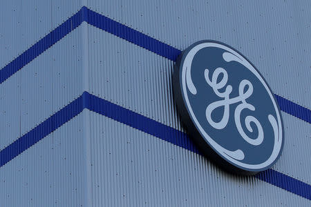 FILE PHOTO: The General Electric logo is pictured on the General Electric offshore wind turbine plant in Montoir-de-Bretagne, near Saint-Nazaire, western France, November 21, 2016. REUTERS/Stephane Mahe/File Photo