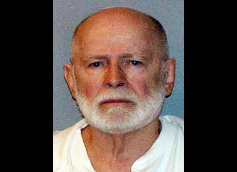 <a href="http://www.huffingtonpost.com/news/whitey-bulger/" target="_blank">James "Whitey" Bulger</a>, a notorious mob boss who spent 16 years at large and 12 years on the FBI Ten Most Wanted Fugitives list, was finally brought to justice in 2013.  The organized crime figure's downfall began roughly two years earlier when authorities, acting on a tip, arrested him on June 22, 2011, at his home in Santa Monica, Calif.  Bulger was charged with 19 counts of murder, 32 counts of racketeering and other charges. Nearly two years passed before his case went to trial in Massachusetts in June of 2013.  During Bulger's trial, the prosecution alleged that during the 1970s and '80s, he led the South Boston's Winter Hill Gang. Bulger, according to the prosecutor, participated in money laundering, extortion and racketeering. They said he committed some murders himself, shooting at least two men in the head, and assisted in the commission of others.  Defense attorneys attacked the credibility of <a href="http://www.huffingtonpost.com/2013/06/17/john-martorano-whitey-bulger_n_3455142.html" target="_blank">key government witnesses</a> and argued that their testimony was bought and paid for by the prosecutors.  On August 12 the jury found Bulger, 84, guilty of participating in 11 killings, as well as extortion, money laundering and weapons charges. Bulger was sentenced to two life terms plus five years.